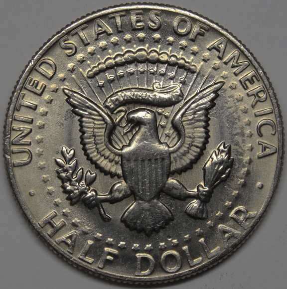 2014 Kennedy half dollar struck-through grease error showing weak missing design detail in the fields